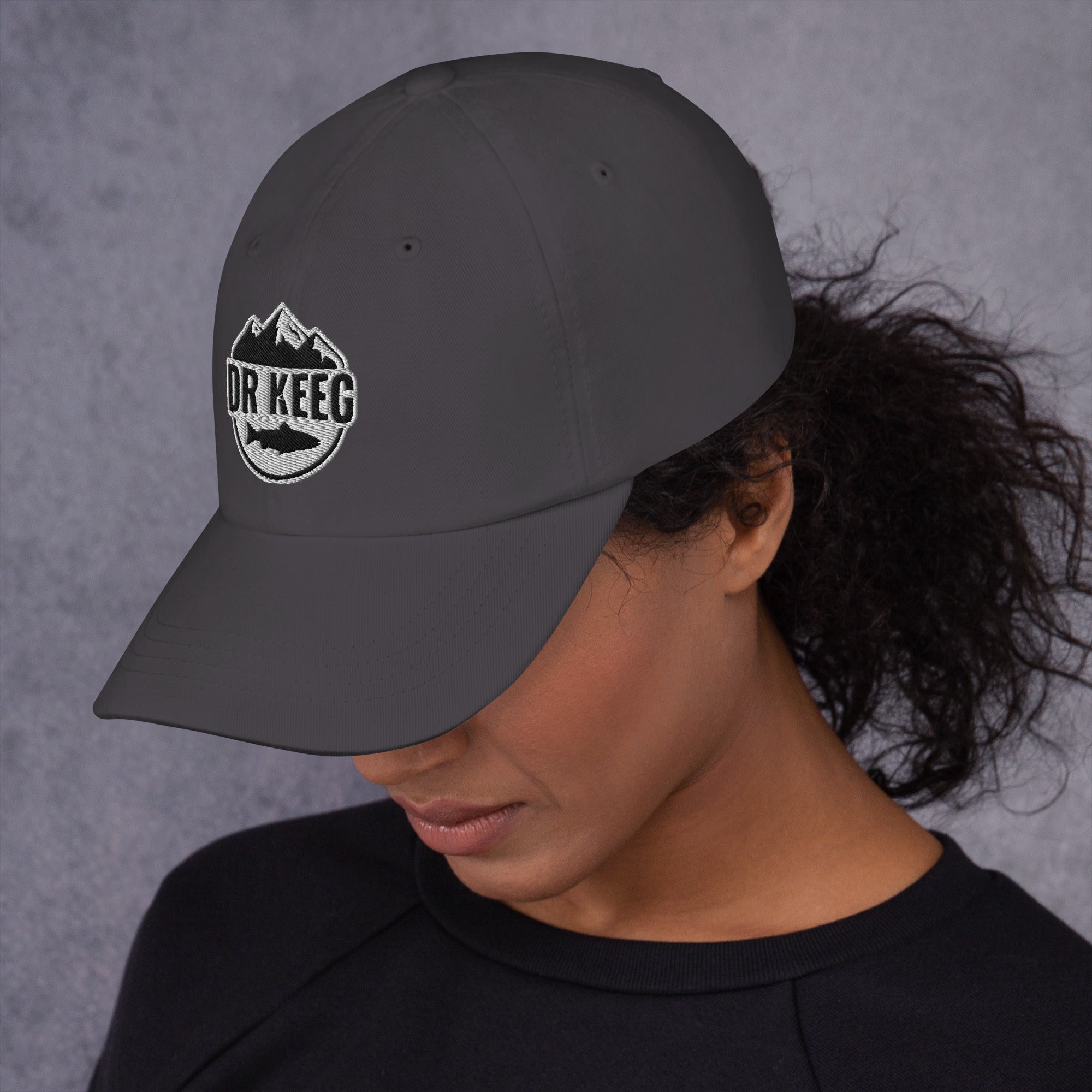 Dr Keeg baseball cap in dark grey, left side view