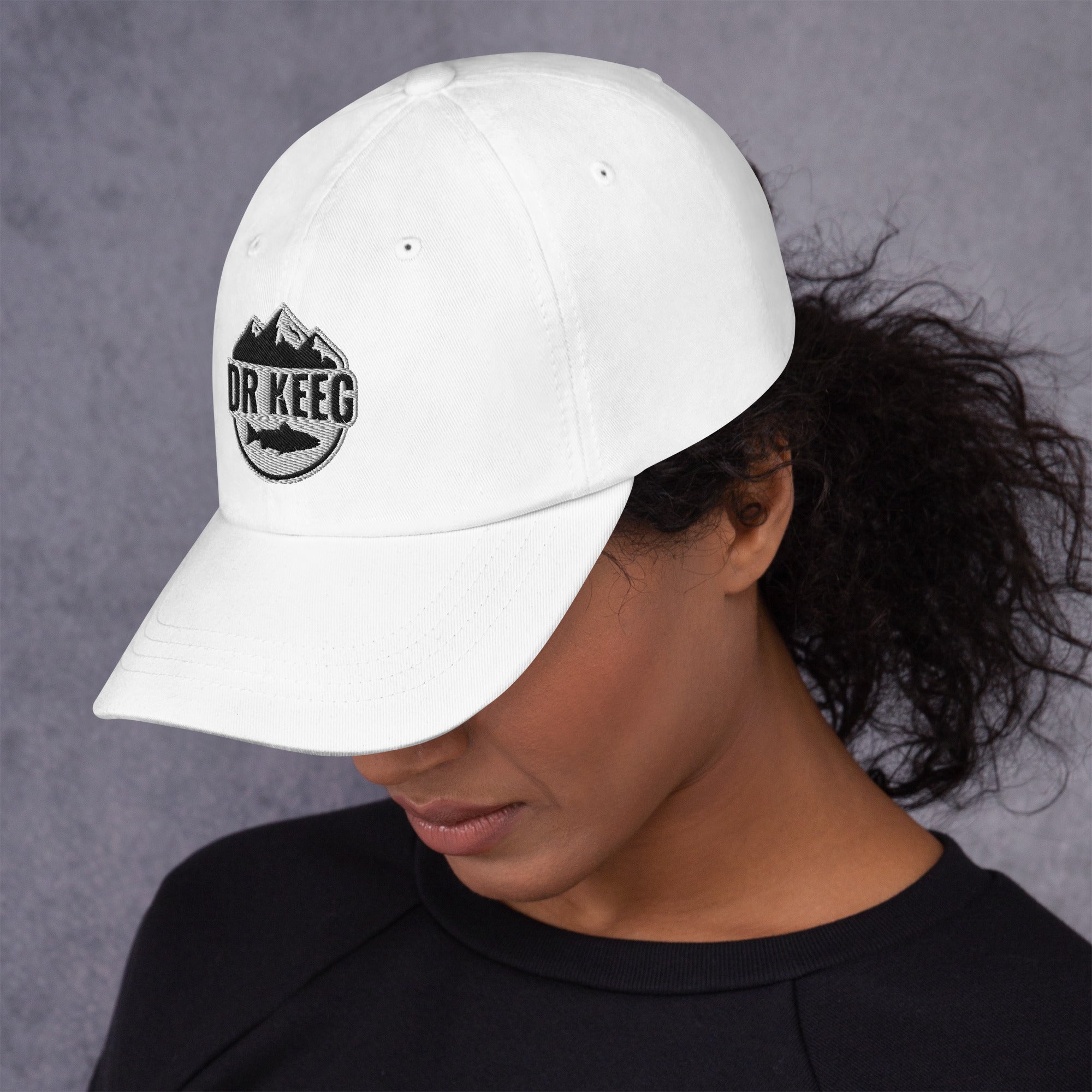 Dr Keeg baseball cap in white, left side view